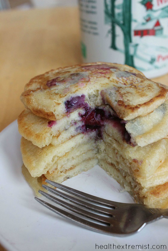 Delicious Paleo Blueberry Pancakes Made with Coconut Flour - These paleo pancakes are soft and fluffy! They're gluten free and dairy free.