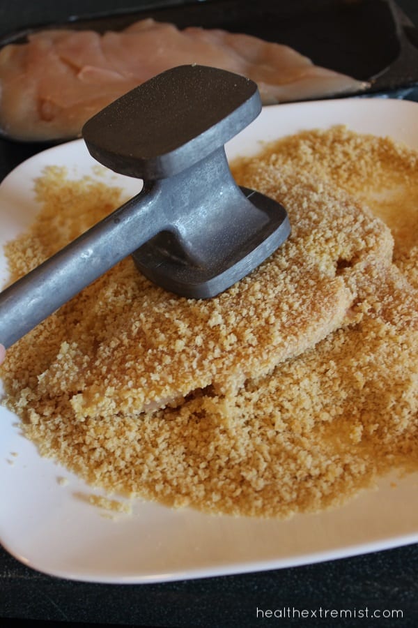 Using a meat tenderizer for paleo breadcrumbs on chicken breast