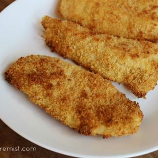 Plate with three slices of oven fried chicken