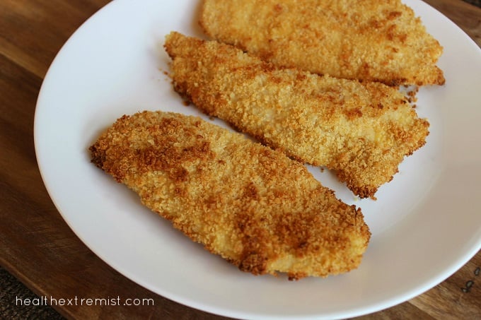 Plate with three slices of oven fried chicken