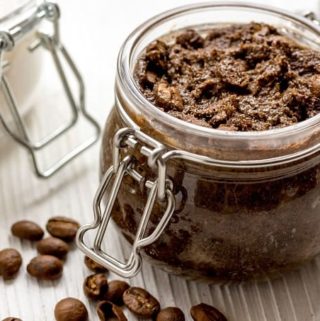 coffee scrub in jar with coffee beans